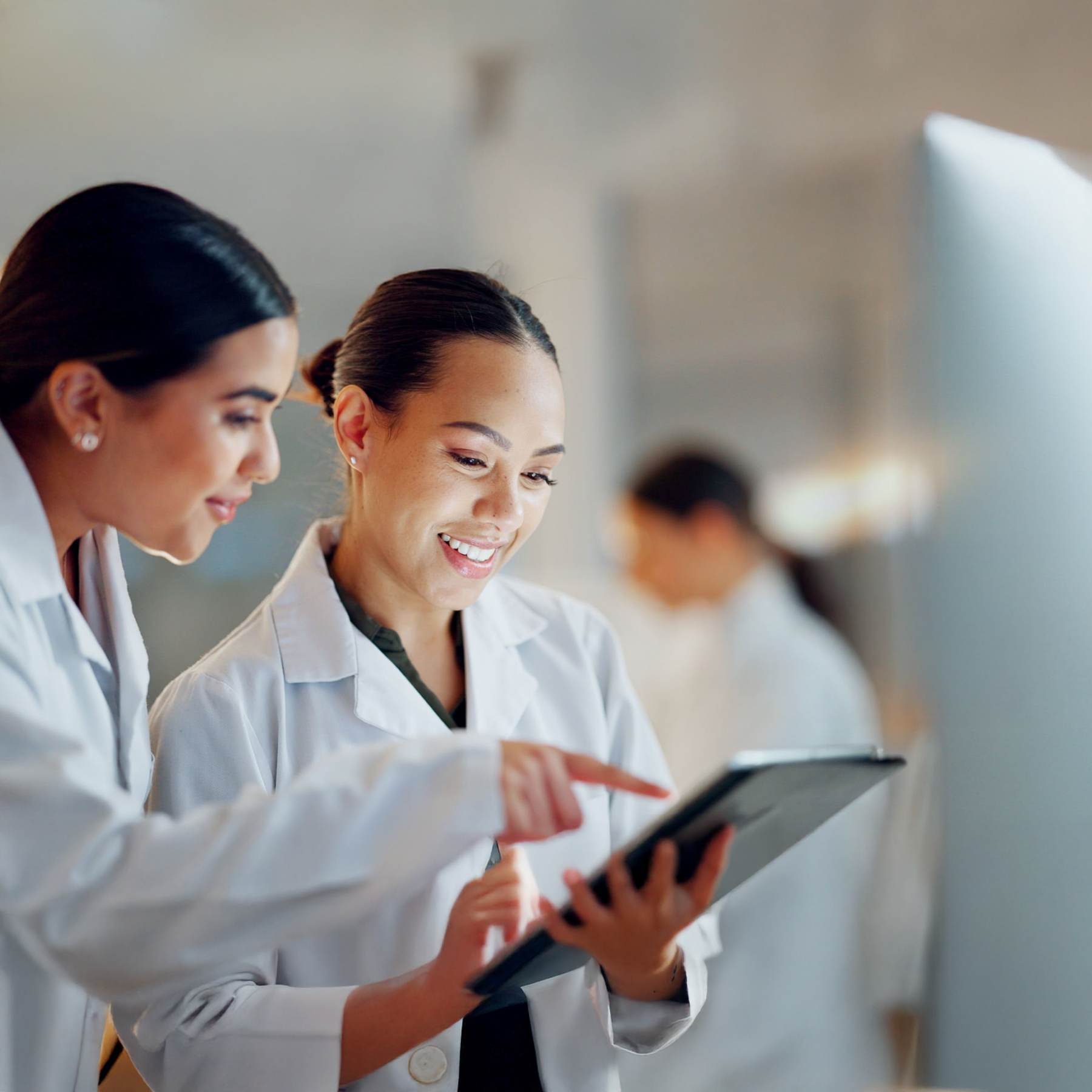 two women looking at better meds app
